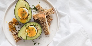 Soft-boiled eggs in avocado boats
