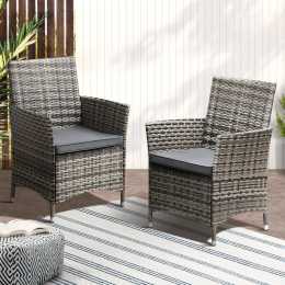 Grey rattan store chairs outdoor